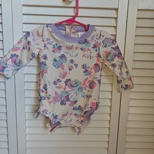 RuffleButts Baby Girls Princess Meadow Long Sleeved Rash Guard Swimsuit 6/12M
